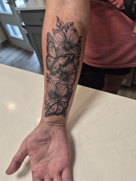 Floral tattoo on the forearm